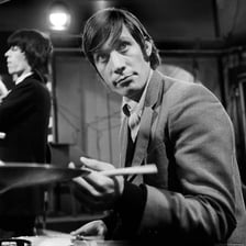Charlie Watts performing as the Rolling Stones’ drummer