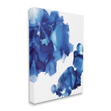 A dark ink blot spread across a sheet of white paper.
