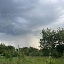 Dark clouds gathering in the sky before a storm.