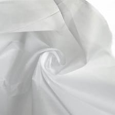 A close view of crisp, sheer organdy fabric.