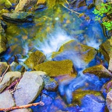 Transparent water in a clear mountain stream.