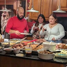 People sharing a meal together at a table