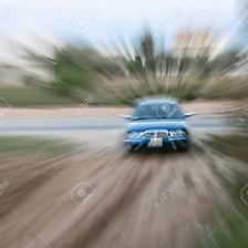 Fast-moving vehicle shown with motion blur