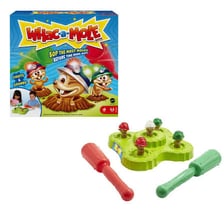 A player holding the mallet used to hit targets in a Whac-A-Mole arcade game.