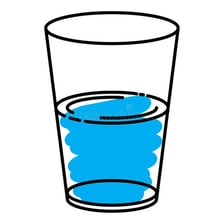 A glass shown as half empty to represent a pessimistic outlook