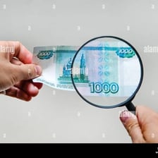 Counterfeit banknotes shown as evidence of forgery