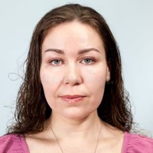A straightforward portrait illustrating an unadorned, conventionally plain appearance