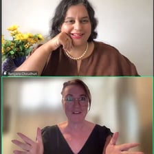 A person using a wink and a nod as nonverbal signals.