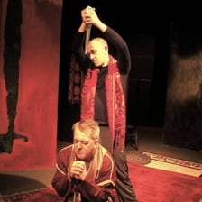 Hamlet and Claudius depicted together in a stage production of Hamlet.
