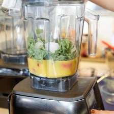 Several ingredients mixed together in a blender.