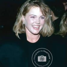 Belinda Carlisle performing as the singer associated with the Go-Go’s.