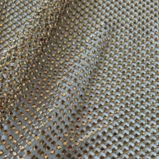 A sparkling diamante rhinestone used as clothing decoration