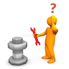 A person attempting to use a tool in an incorrect way