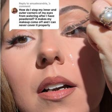 A visible tear track or stain on a person’s cheek