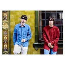 Liam and Noel Gallagher pictured in connection with their home city of Manchester.