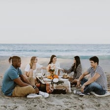 University students relaxing during a holiday break at a beach