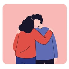 Two people showing fondness through a warm embrace.