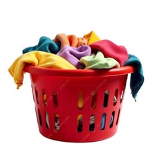 A household laundry hamper containing clothes awaiting washing