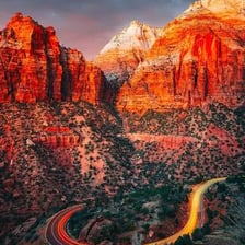 The red cliffs and canyon landscape of Zion National Park in Utah.