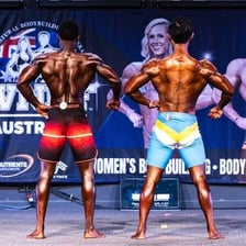 A bodybuilder displaying a well-developed muscular physique.