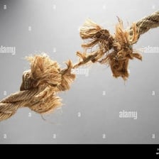 A rope stretched tightly with no visible slack.