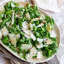 Fresh green rocket, also called arugula, served as salad leaves