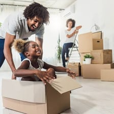 A real estate agent helping a family with a relocation