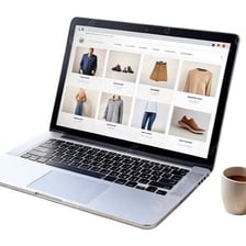 A laptop displaying an online shopping site.
