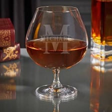 A glass of amber cognac.
