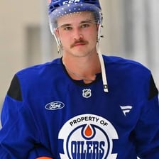 An Edmonton Oilers hockey player wearing the team uniform.