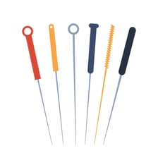 An educational illustration showing acupuncture needles placed in the skin.