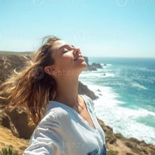 A person perceiving a breeze outdoors.