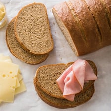 Rye bread loaves displayed at a deli