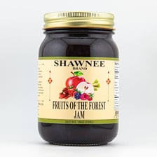 A glass jar filled with fruit jam.