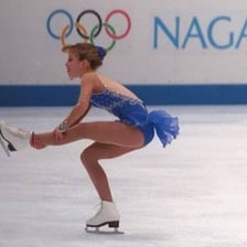 Tara Lipinski performing a figure-skating routine.