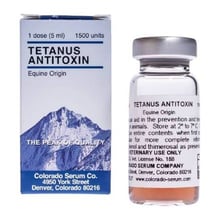 A medical vial labeled as antitoxin serum