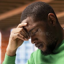 A person shaking their head to express disapproval.