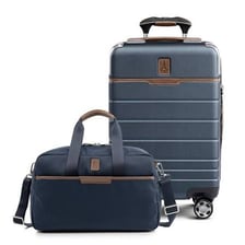 A small suitcase used as airline carry-on luggage
