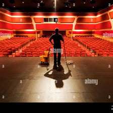 A nearly empty theater stage after an unsuccessful production