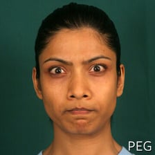 A person displaying a resentful, unhappy expression.