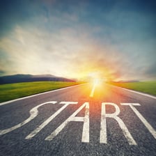 A person beginning again at the start of a path