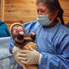 A midwife providing care during childbirth