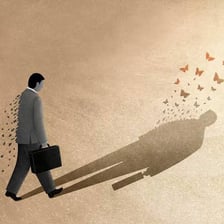 A person in a modest setting representing financial hardship