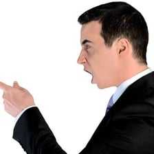 A person gesturing uncertainly while asking whether they are responsible