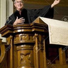 A preacher speaking from a church pulpit