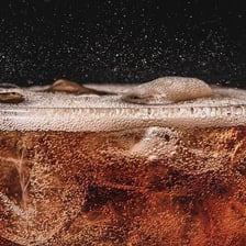 Carbonated soda in a glass
