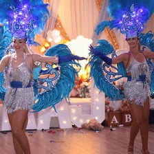 Dancers performing samba in colorful Brazilian attire