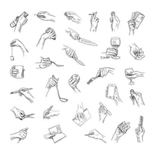 A hand grasping and lifting an object