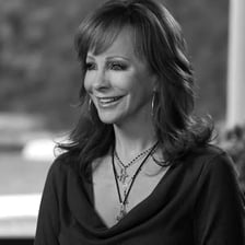 Country singer Reba McEntire performing onstage.