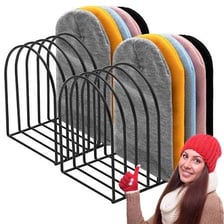 Several knit beanies and caps displayed together